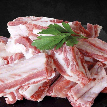 1 kg de Costillas de cerdo Abrasador troceadas